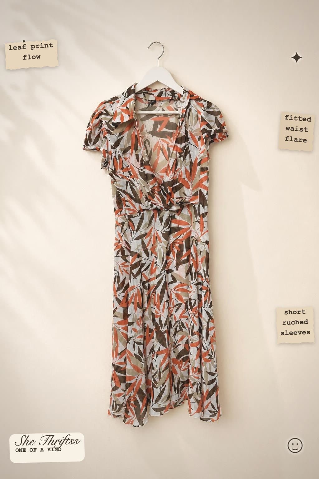 Wrap front leaf print dress
